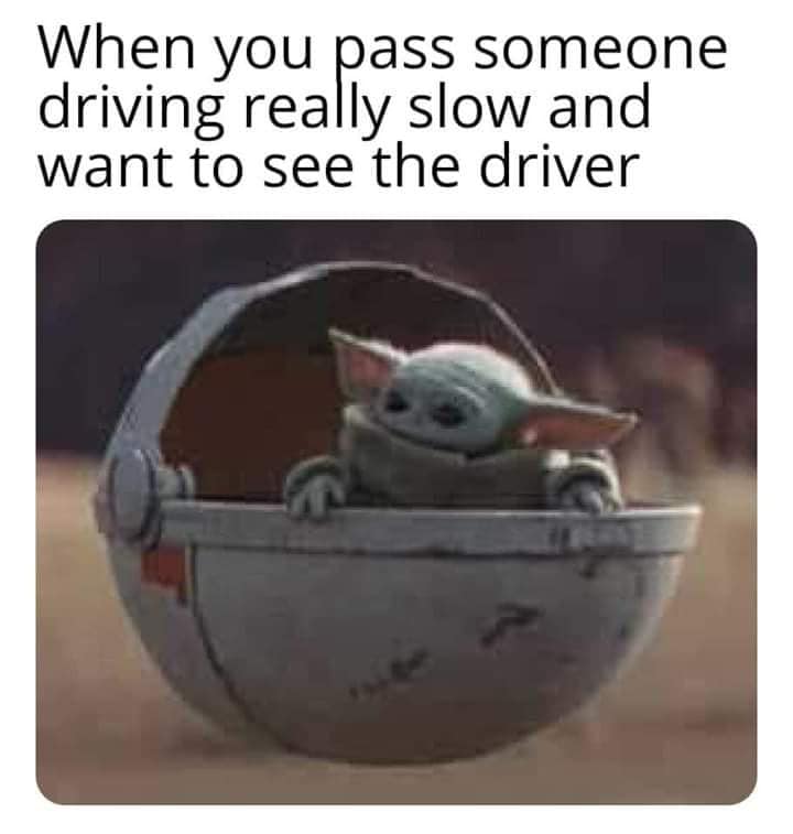 This meme features a photo of Baby Yoda from the Star Wars franchise, sitting in the cockpit of the Millennium Falcon. The text above the image reads: "When you see someone driving slow and you want to pass them but you know you'll just get stuck behind them anyway."